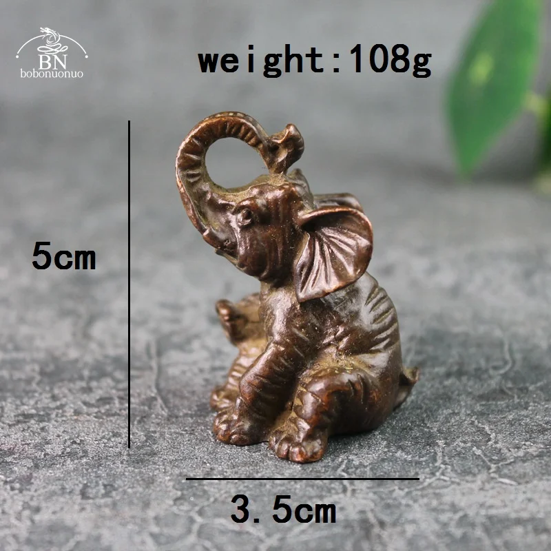 

Медная статуэтка слона