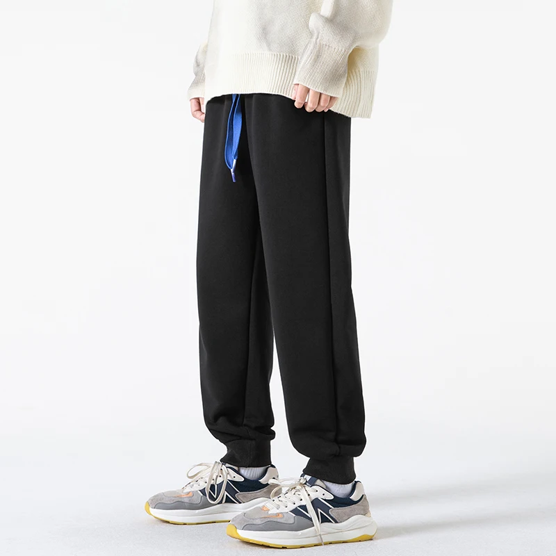 

2022 Autumn and Winter New Men's Fashion Casual Sports Pants Men's Solid Color Thick Warm Jogger pants Large Size High Qualit