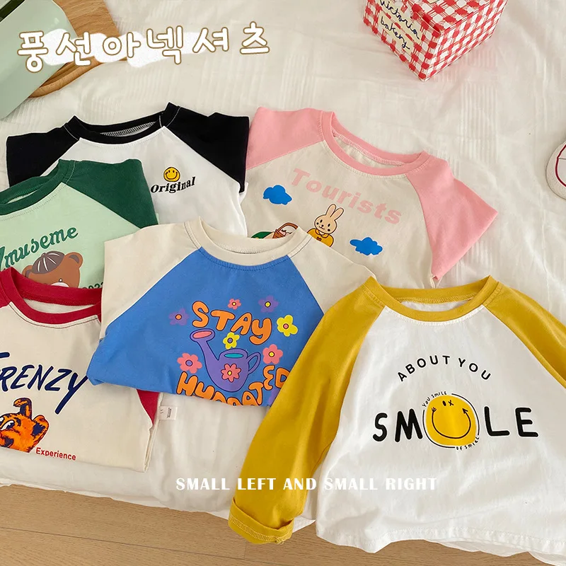 

Детская футболка с длинными рукавами и надписью