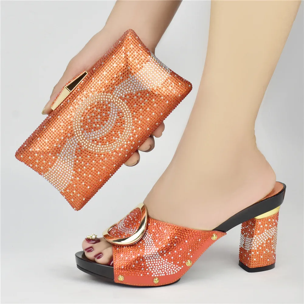

Orange Color African Shoes And Bag Matching Set With Stones Shoes Women Italian design Shoes And Bag Set For Party Wedding