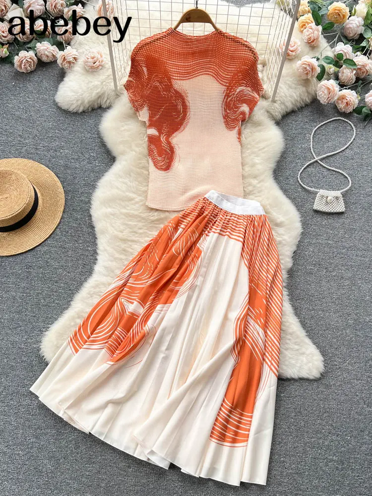 

Bohemian Vacation Beach 2pcs Set Women Floral Printed Short Sleeve Tops And High Waist Pleated Long Skirt Suit Spring Summer