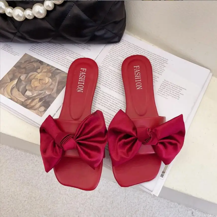 Летние женские тапочки на плоской подошве с бантом-бабочкой слитные удобная