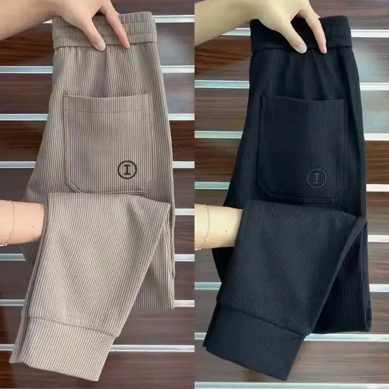 

Весенне-осенние новые высококачественные повседневные спортивные брюки мужские спортивные брюки трендовые спортивные брюки в гонконгском стиле эластичные брюки-шаровары для маленьких ног