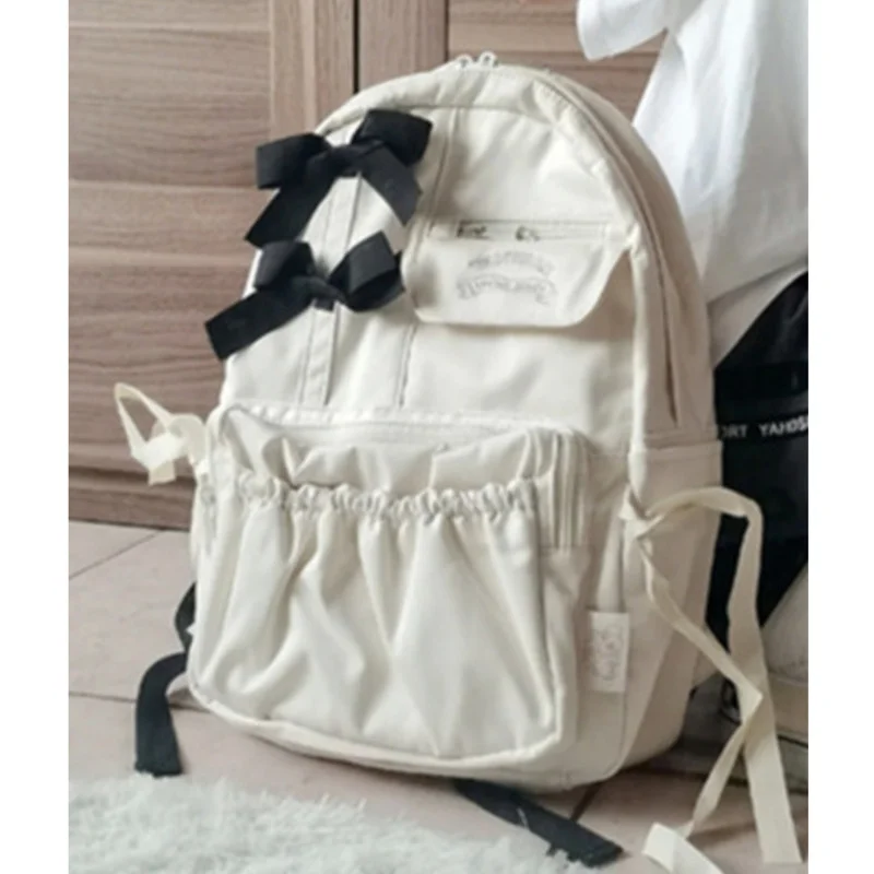 

junior backpack high school female college students appearance 2023 new shell cow leater Short Stone Pattern Black white Style