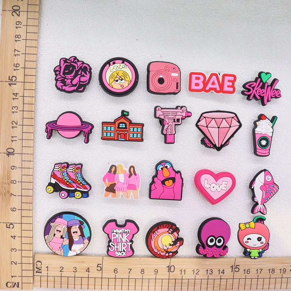 

1-25Pcs PVC Croc Charms Pink T-shirt Girl Flower Gun Planet Love Fish Garden Shoes Accessories Decorations DIY Fit Wristbands