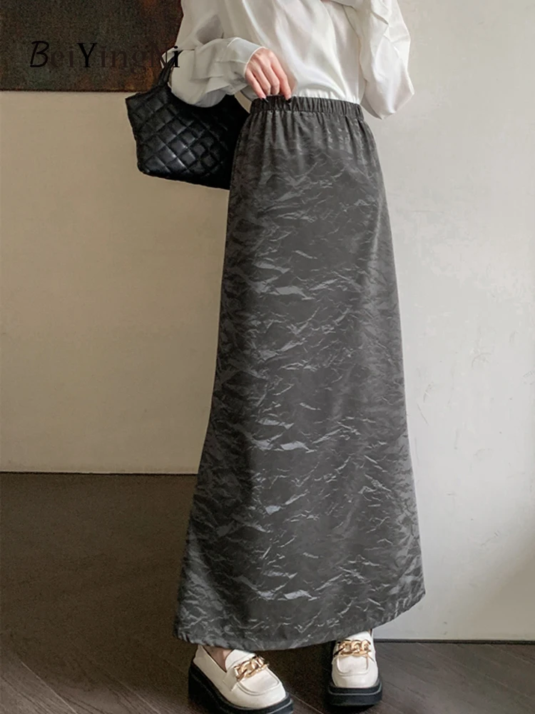 

Женская длинная юбка Beiyingni, однотонная черная трапециевидная юбка из искусственной кожи с цветочным принтом, элегантная юбка в стиле High Street