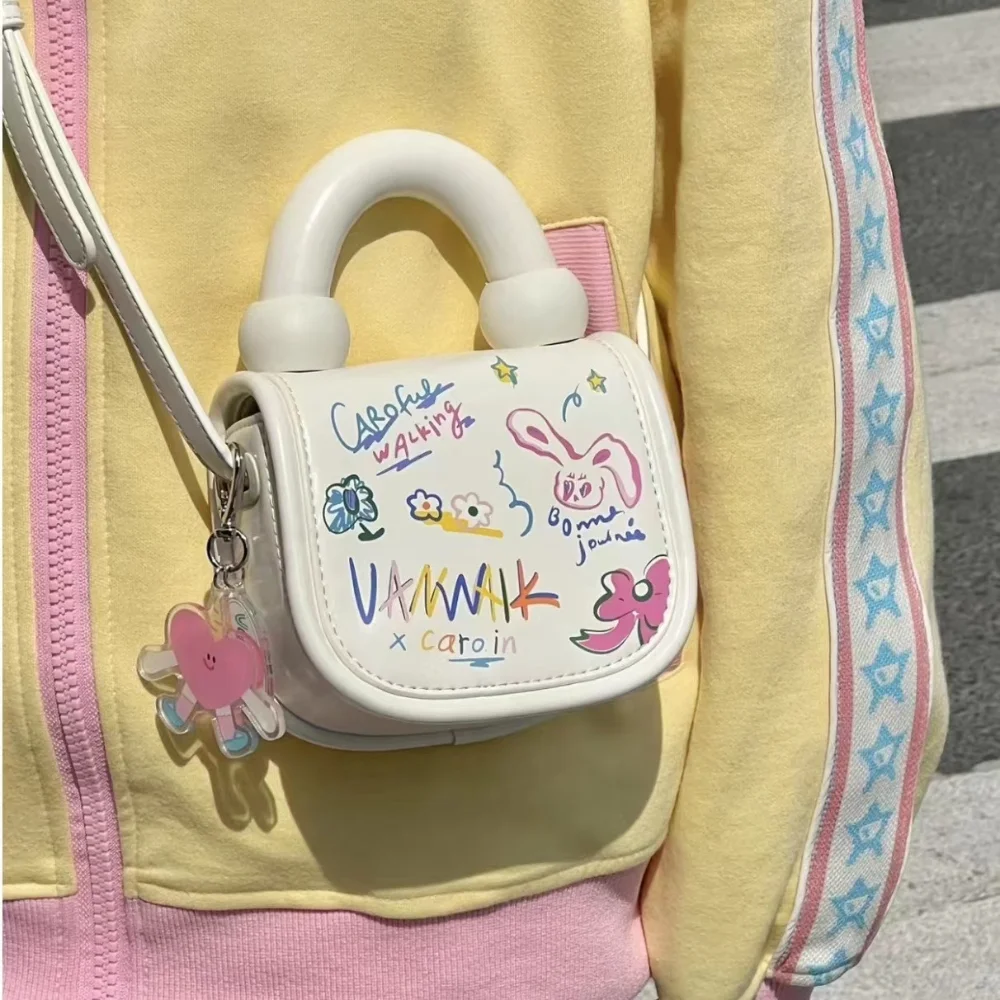 

Mini Cute Foreign Cartoon Graffiti Bag Female 2023 Spring/summer New Korean Student Crossbody Bag Tote Bag Tide