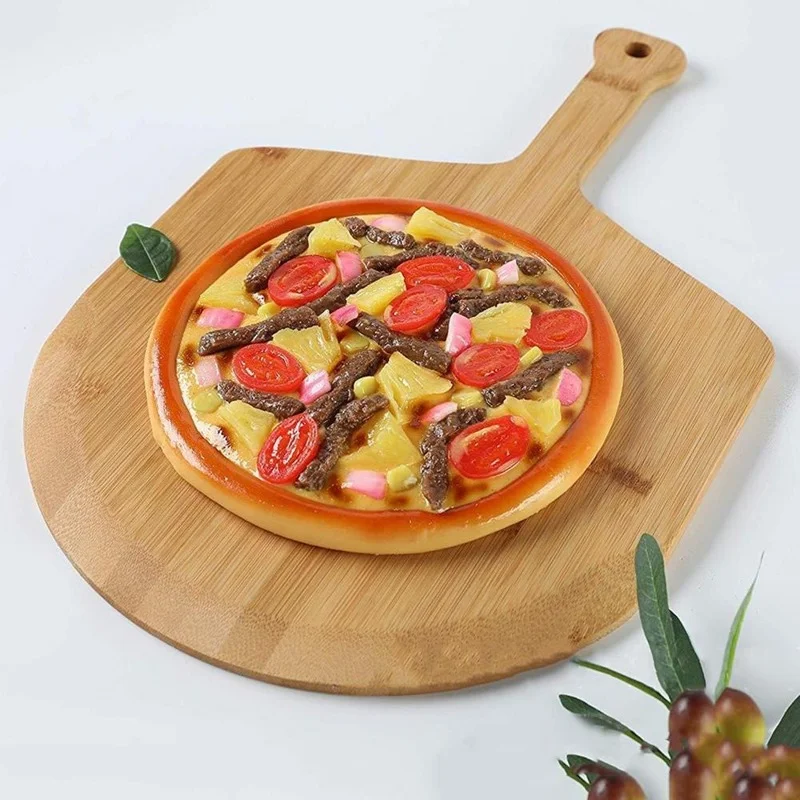

Hot Sale Bamboo Pizza Peel Wood Serving Pan Cheese and Charcuterie Boards Pizza Board Pizza Paddle Cutting Board with Handle