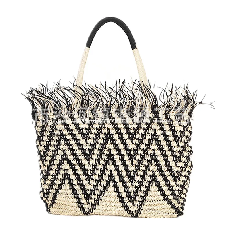 2022 new bag women's tassel geometric pattern crochet hand-held shoulder beach woven straw |