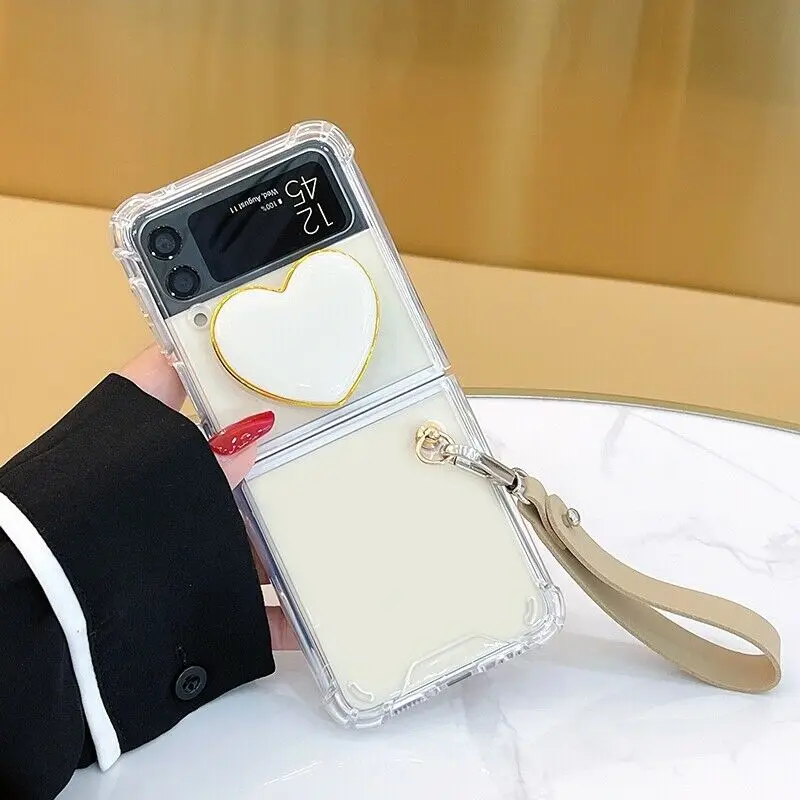 

Luxury Fashion Love Heart Stand Holder Hand Strap Phone Case For Samsung Galaxy ZFlip ZFlip3 5G Cute Clear Shockproof Back Cover