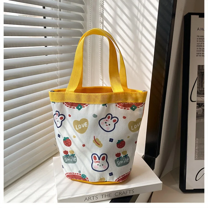 

New Ins Cute Cartoon Bunny Hand Gift Bucket Bag Portable Canvas Bag Girl Heart round Barrel Lunch Box Bag