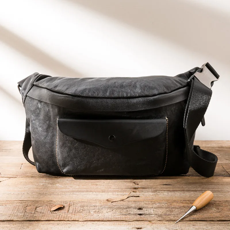 Simple casual designer first layer cowhide men's black large-capacity chest bag outdoor daily weekend real leather messenger bag