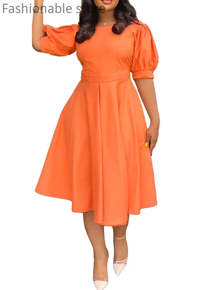 

Женское платье-трапеция на пуговицах с рукавами-фонариками и завышенной талией