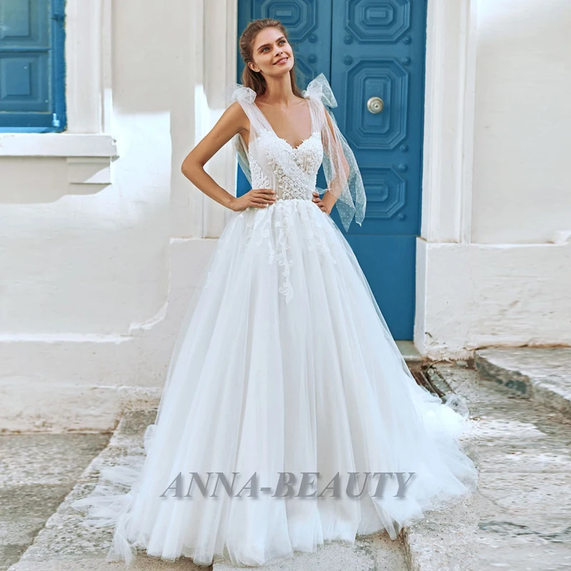 

Anna Appliques Wedding Dresses V Neck Court Train Tulle Backless Zipper Spaghetti Strap Robe De Soirée De Mariage Made To Order