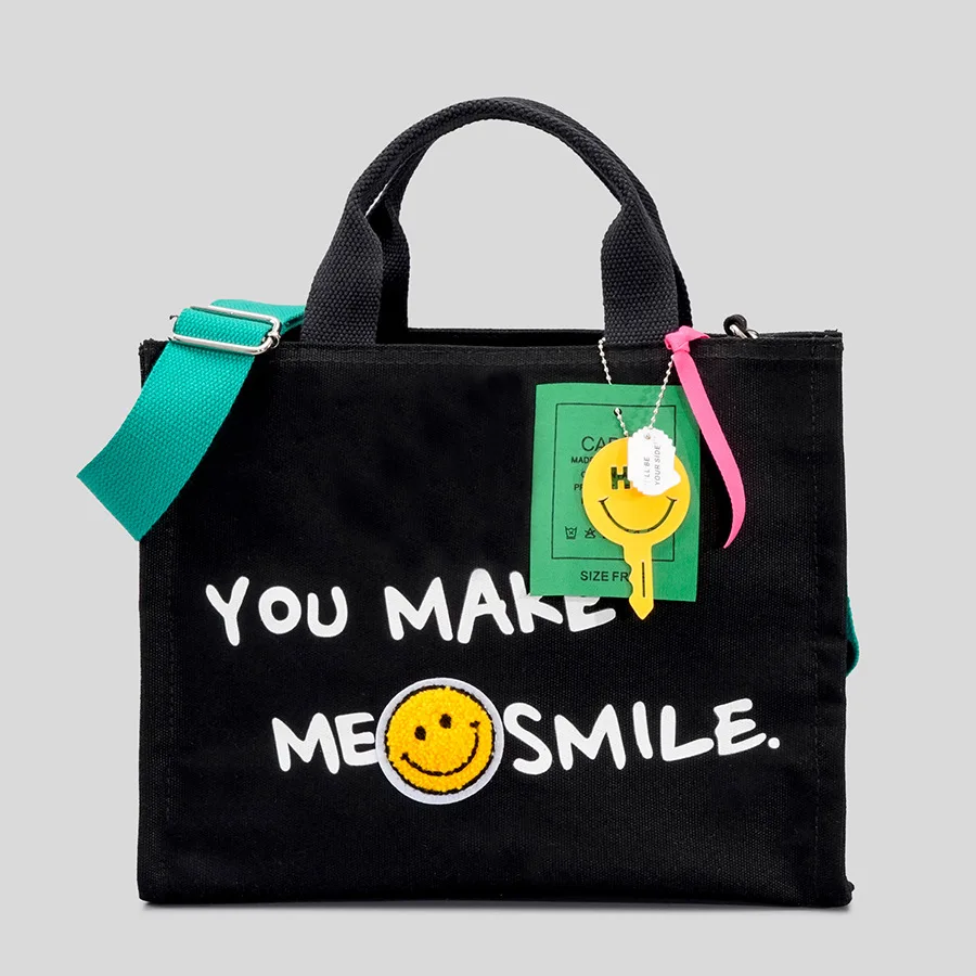 

Casual Canvas Tote Bag Designer Letters Women Handbags Smiling Face Shoulder Crossbody Bags Small Shopper Purses 2023 Summer Sac
