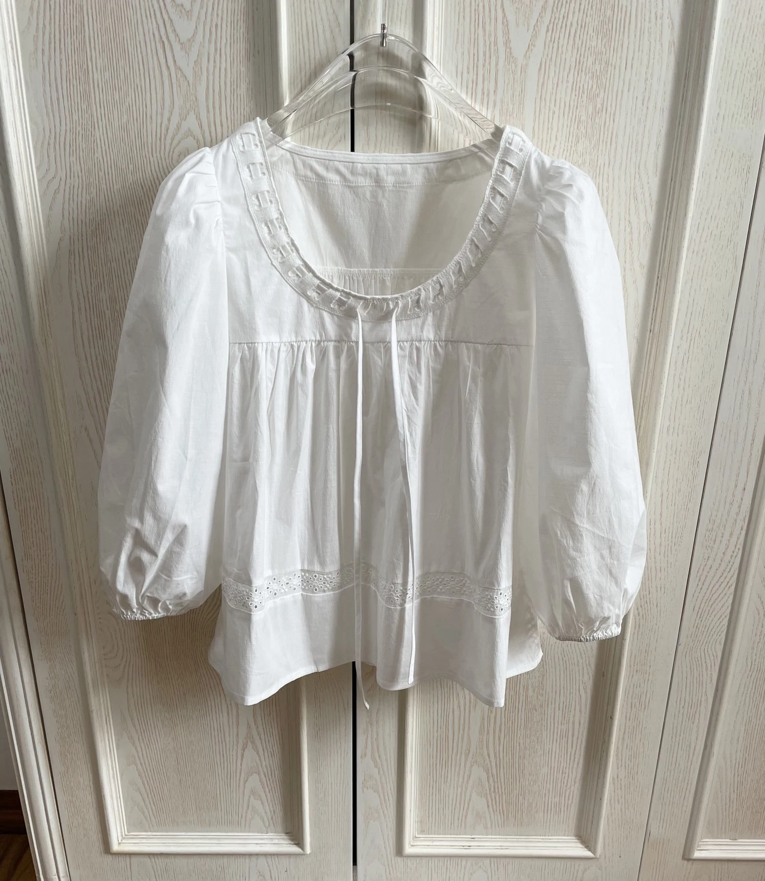 

Spring and summer light resort style romantic pure white lace-up seven-point bubble sleeve large U-neck top