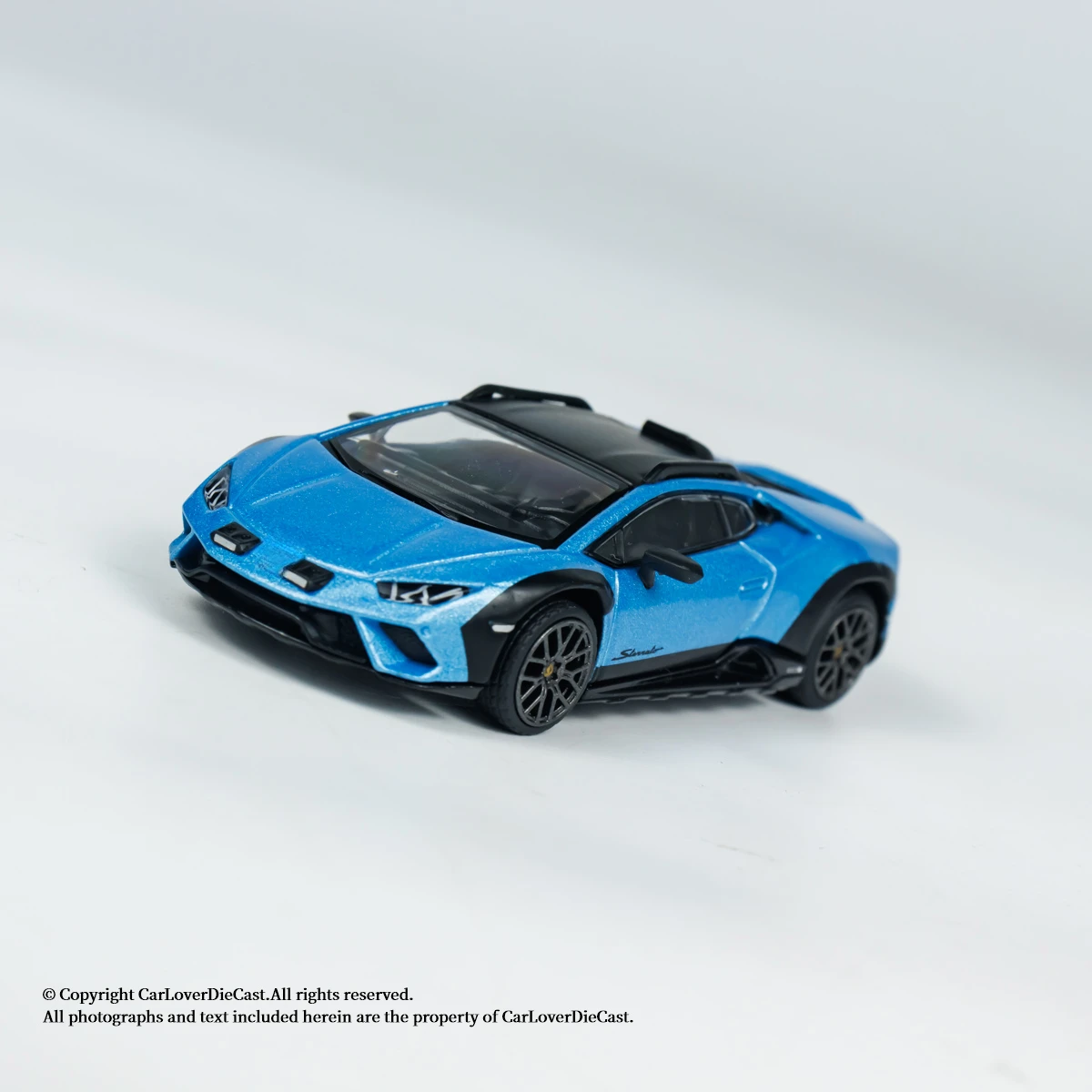 Фото Модель автомобиля MINIGT 1:64 Huracán Sterrato Blu Aegir №2