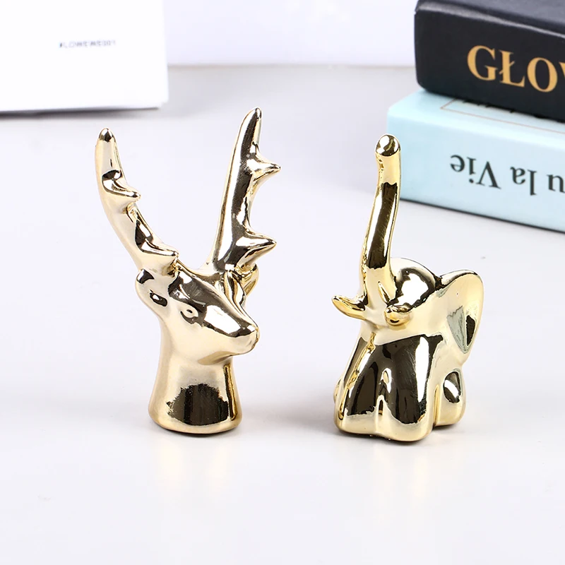 

Ceramic Cute Gold Elephant Deer Head Horns Figurines Modern Statue Furnishings