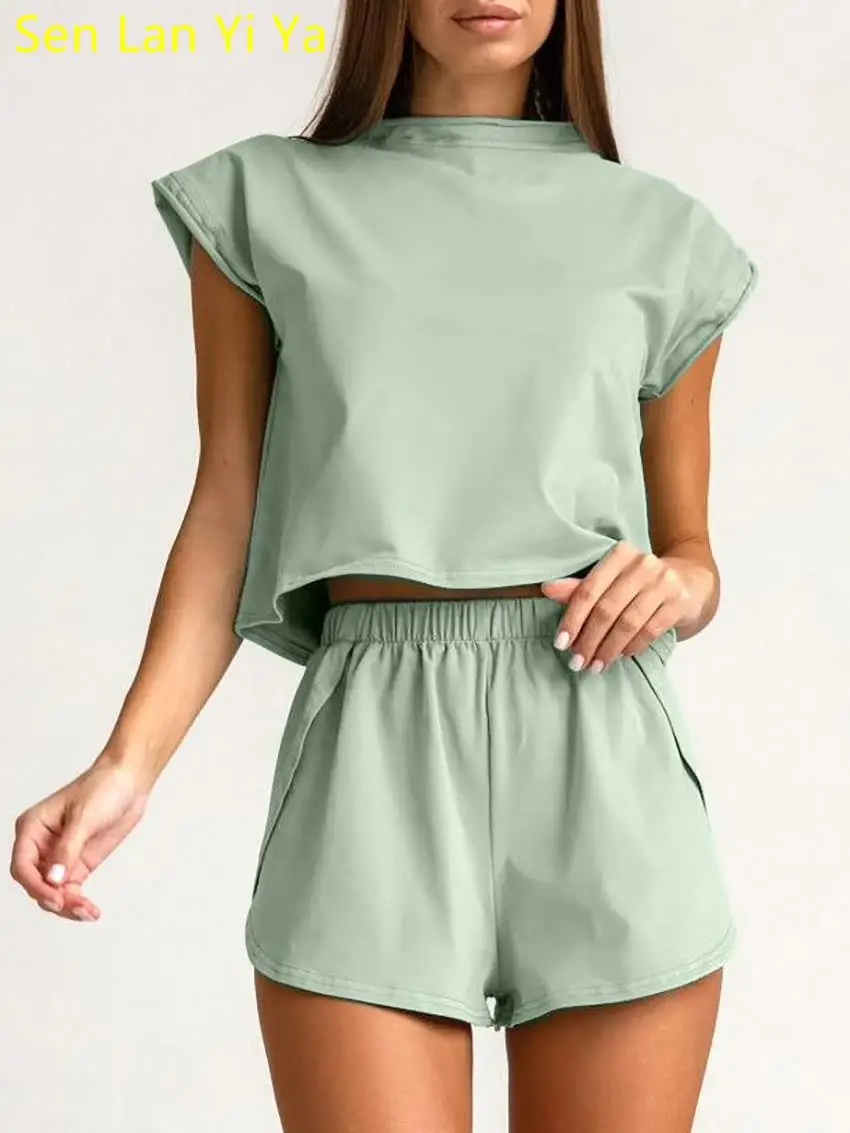 

Женский спортивный костюм Sen Lan Yi Ya2023, повседневный зеленый костюм из 2 предметов, летний костюм с простым коротким рукавом и асимметричными шортами с разрезом
