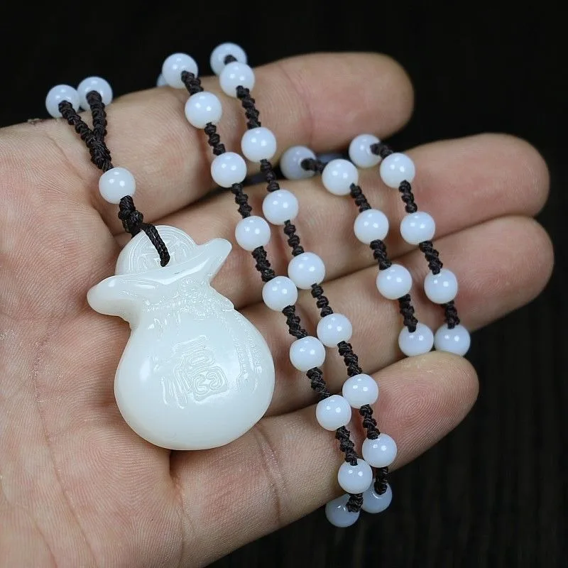 У Huanglong Jasper имелся раньше от поколения до мужские и женские ожерелья с монетами