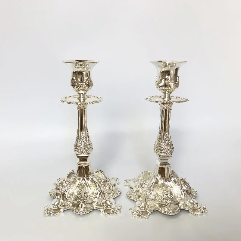 

Золотые и серебряные подсвечники PEANDIM