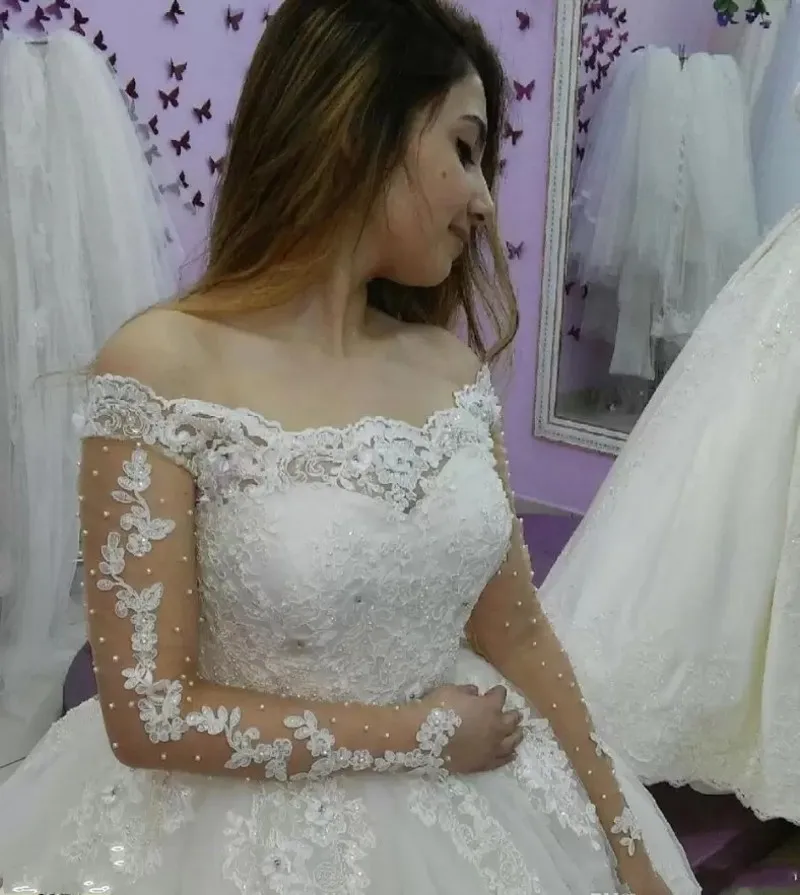 

New Lace Arabic Dubai Wedding Dresses 2022 Off The Shoulder Sheer Long Sleeves Pearls Bride Gowns Vestidos De Noiva Robe Mariee