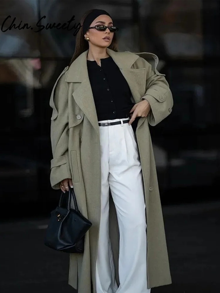 Однотонное двубортное длинное женское пальто с длинными рукавами на шнуровке