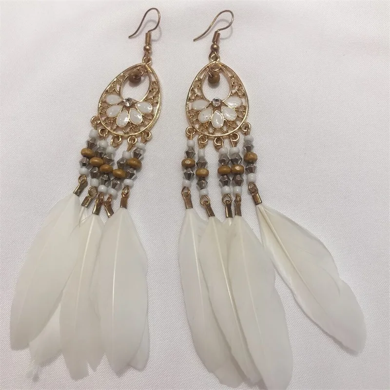 

Retro tassel colored rice bead earrings bohemian ethnic feather female European and American earrings