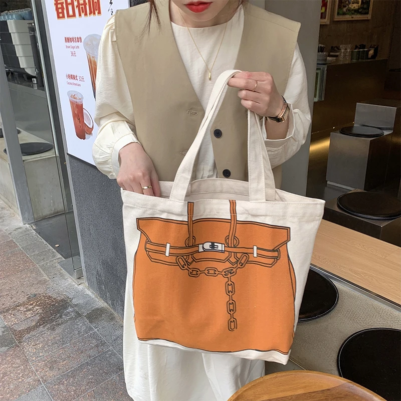 

New Tide Large Capacity Canvas Shoulder Bag Lock Chain Pattern Versatile Fashion Canvas Bag Vagabond Commuter Style Handbag