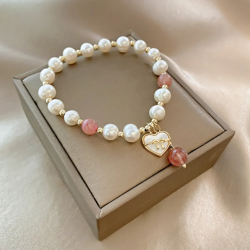 

Niche design versatile opal pearl bracelet female love crystal pendant fashionable and elegant hand string hand jewelry