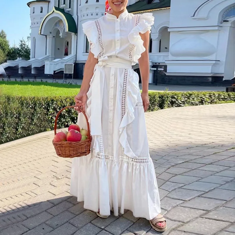 

European station princess dress 2022 spring and summer new ruffled stitching solid color single-breasted strappy long dress