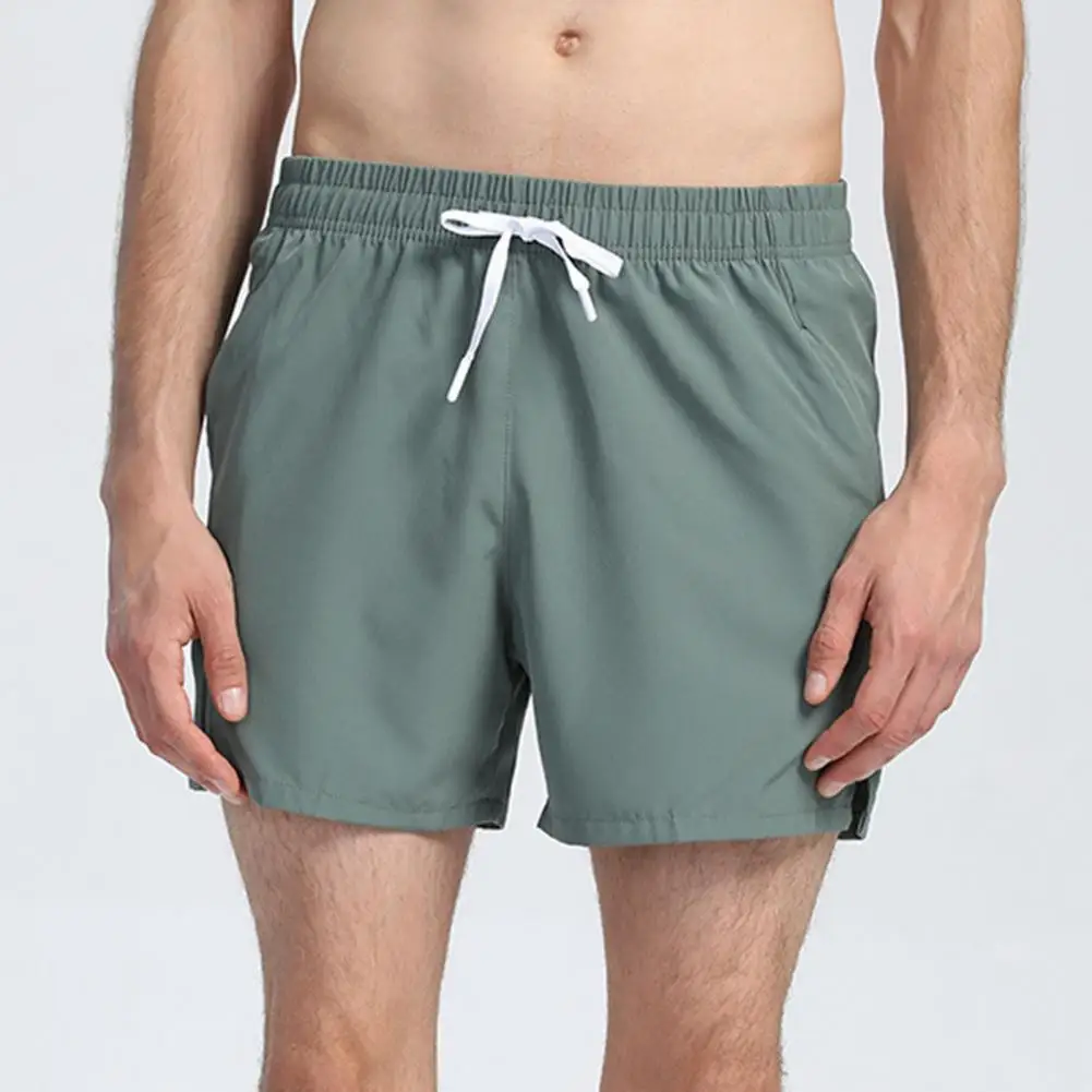 

Men Summer Shorts Drawstring Solid Color Pocket Men Shorts Elastic Waist Split Men Shorts Jogging Sports Shorts Male Clothes