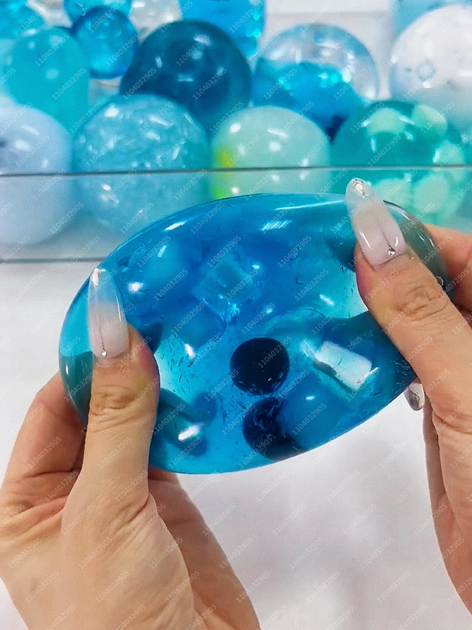 Фото Мяч-антистресс Ocean Blue Slushie в форме бутылки, тянущийся, хрустящий, сжимаемый, сенсорная игрушка ASMR для взрослых №3