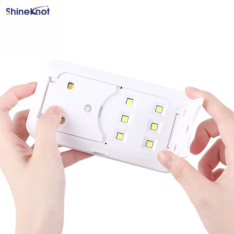 Фото SHINEKNOT 36W Мини-лампа для ногтей, портативная, с питанием от USB, многофункциональная УФ-лампа, ручная светодиодная лампа для маникюра, складная подставка, легкость переноски №5