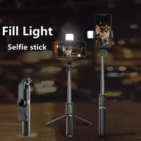 2022 new fashionable wireless bluetooth selfie stick tripod with fill light shutter remote control for ios android smart phone