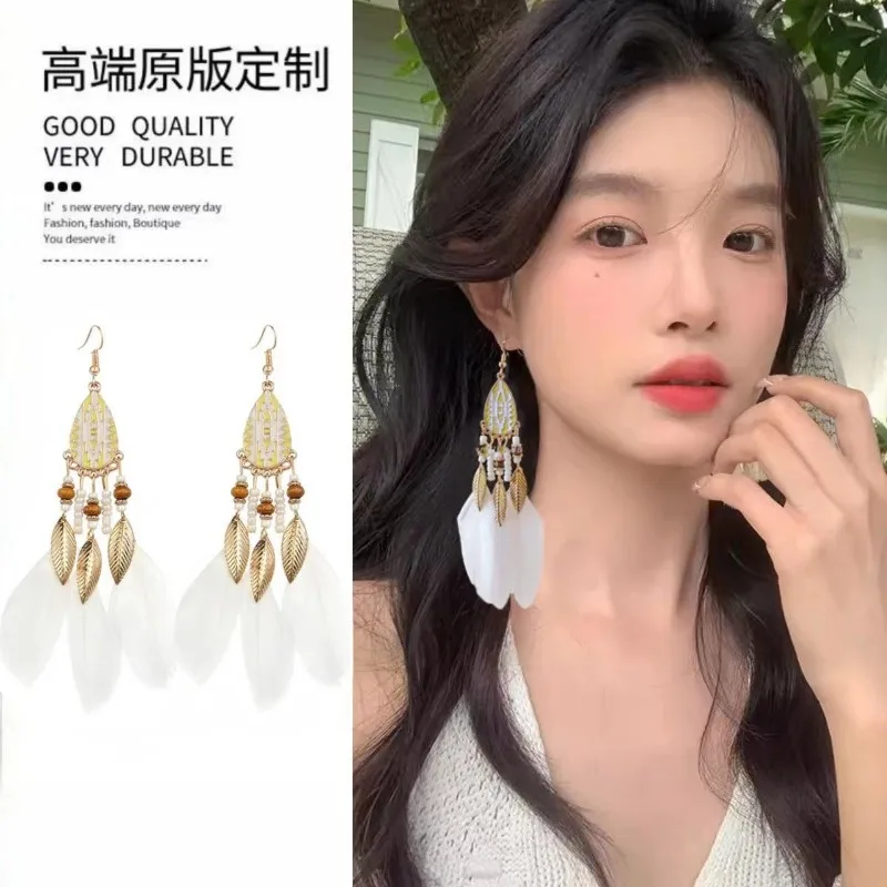 Богемные серьги с бахромой из рисовых бусин и каплями воды нишевые крючком для