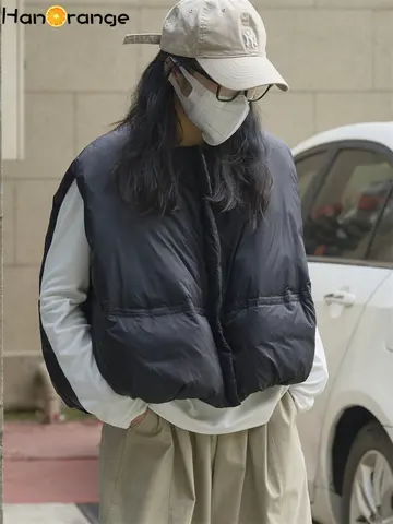 HanOrange 2024 черный/синий/светло-абрикосовый пуховый жилет