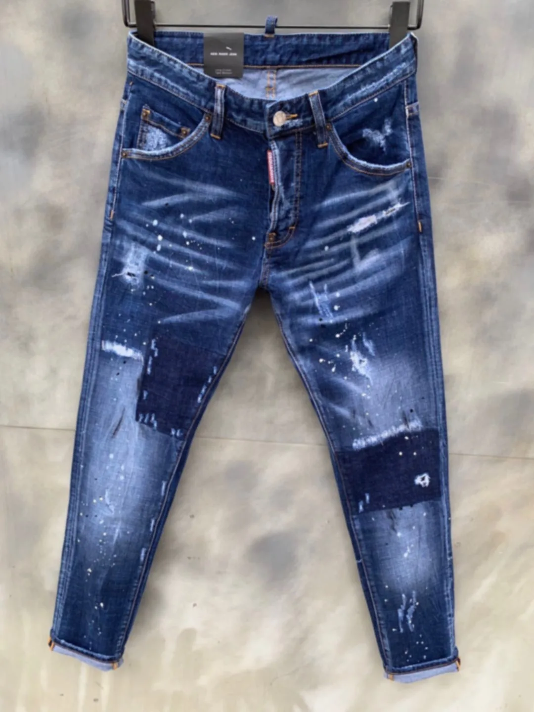 

D2 jeans men's broken holes, splash-ink paint, point knife cut and scraped patches, personalized fashion pants, slim elastic pan