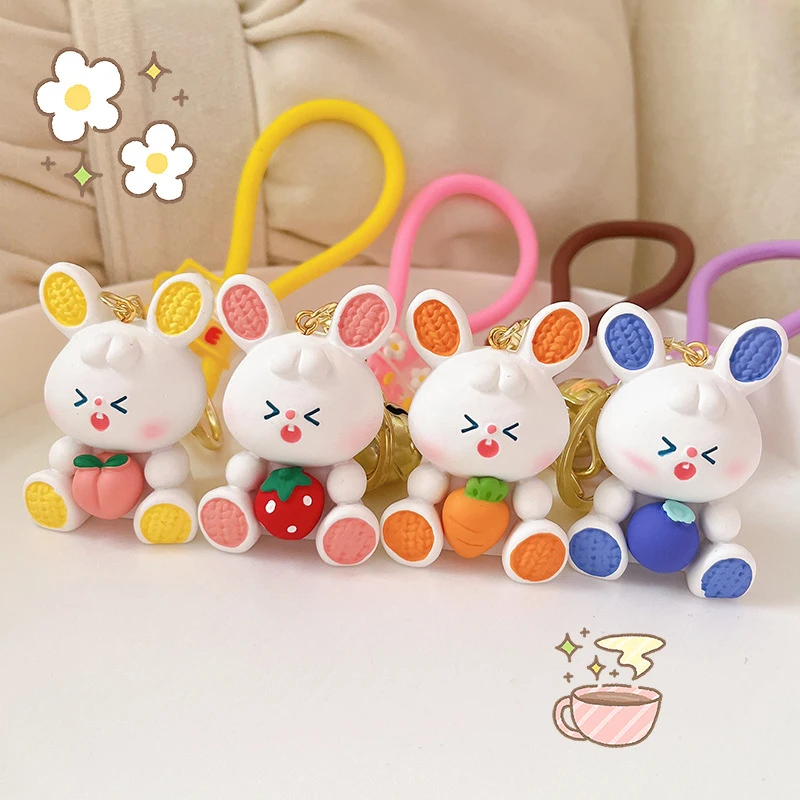 

Creative Cute Fruit Holding Series Resin Toys Strawberry Rabbit Keychain Party Gifts Home Decoration Delicate Bag Pendant