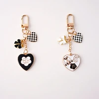 cartoon love bow key ring fashion black and white key ring airpods bag pendant mobile phone car key jewelry best friend gift