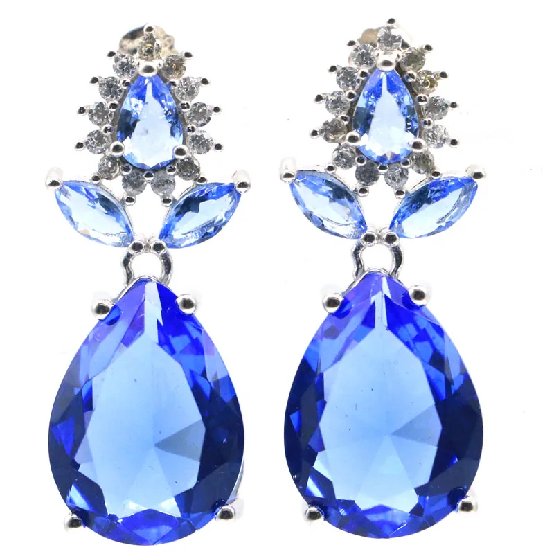

Серьги из серебра 925 пробы с танзанитами и белыми фианитами, 30 х12 мм