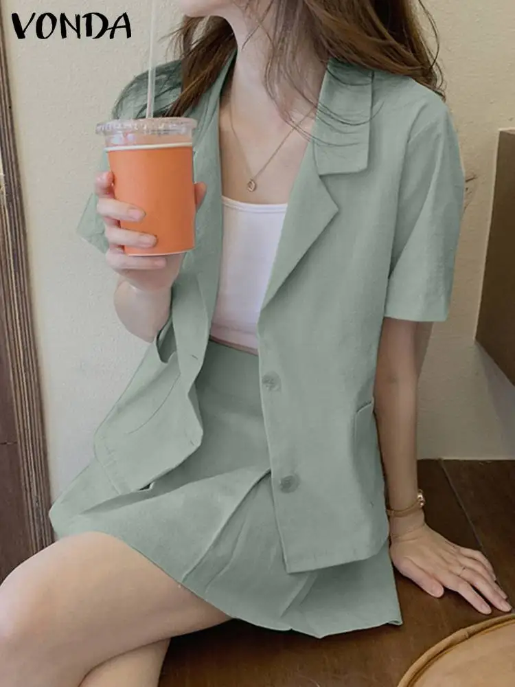 

VONDA 2022 Summer Women Short Sleeve Office Button Skirts Suit Lady Lapel Pleated Pleated High Waist Pleated Mini Skirt Set