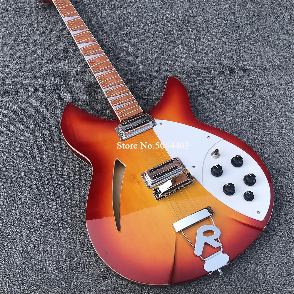 

High quality Rickon 360 electric guitar. 6-string half-empty core with F hole, sunset red paint, special postage.