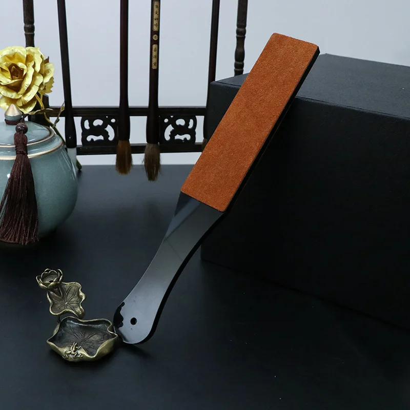 

Двусторонняя ручная точилка для кожи