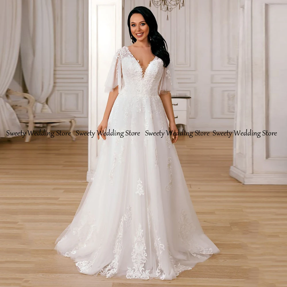 

Jiayigong Plus Size Bridal Gown for Women V Neck Half Sleeves Back Zipper with Buttons Applique Soft Tulle Bride Wedding Dress
