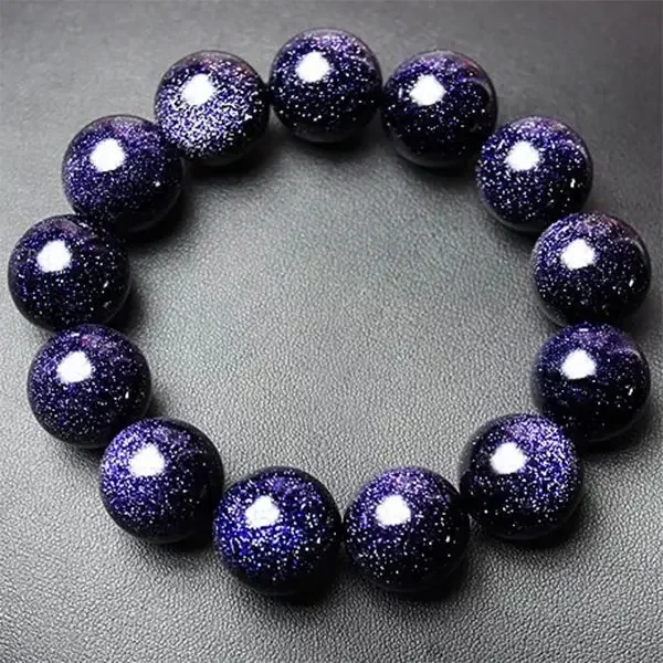 Браслет из голубого песка со звездами и кристаллами