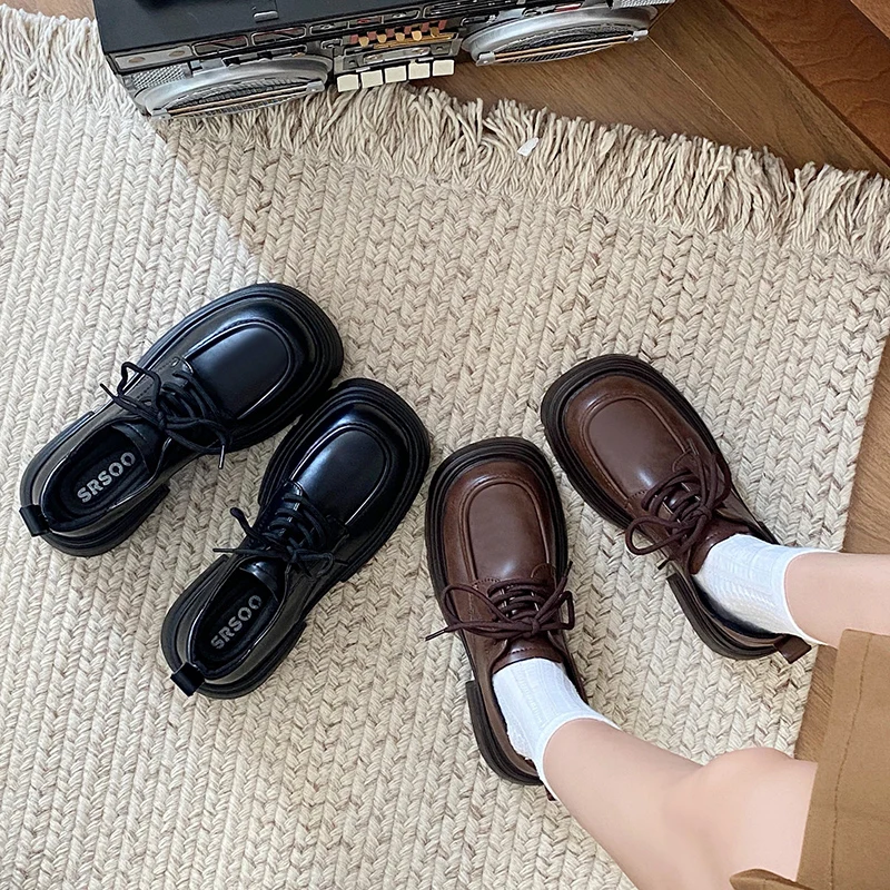 Женские кожаные сабо на плоской подошве