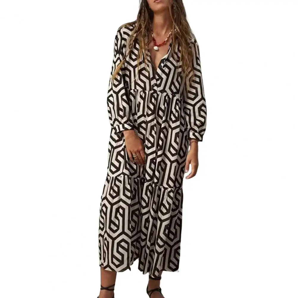 

Женское платье-рубашка средней длины на пуговицах, с длинным рукавом