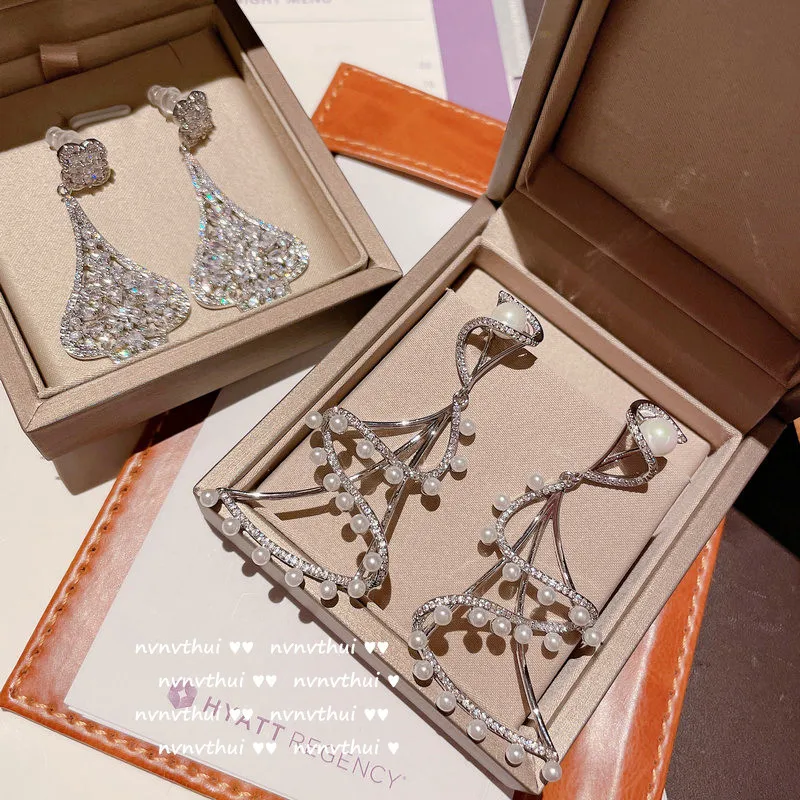 

Shining Leaves Water Drop Gem Earrings 18K Gold Plated Multi-Cut Zircon Pearl Ripple Earrings Earrings chinese fashion