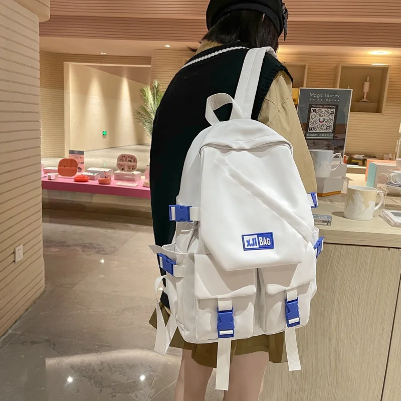 

2022 autumn large-capacity simple labeling special-shaped student schoolbag Korean version of the backpack